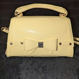 Elegant Yellow Handbag with Bow Accent